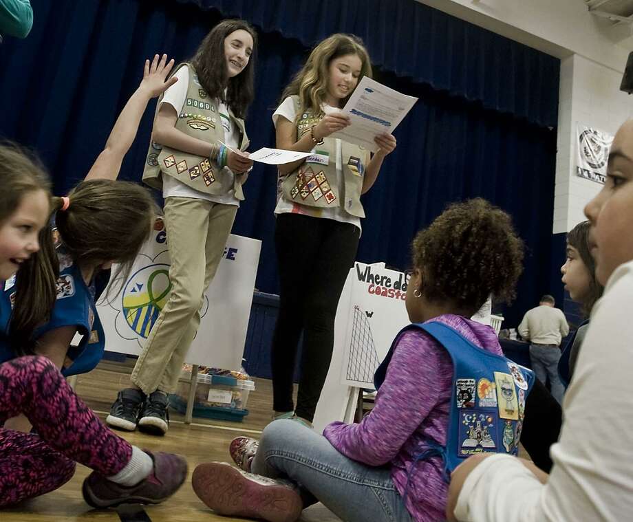 Danbury Cadet Girl Scouts Christina Dillon, 13, and Jordan Sellner, 14, give instructions for a roller coaster design challenge during a STEM event at St. Gregory the Great School in Danbury. Sunday, April 29, 2018 Photo: Scott Mullin / For Hearst Connecticut Media / The News-Times Freelance