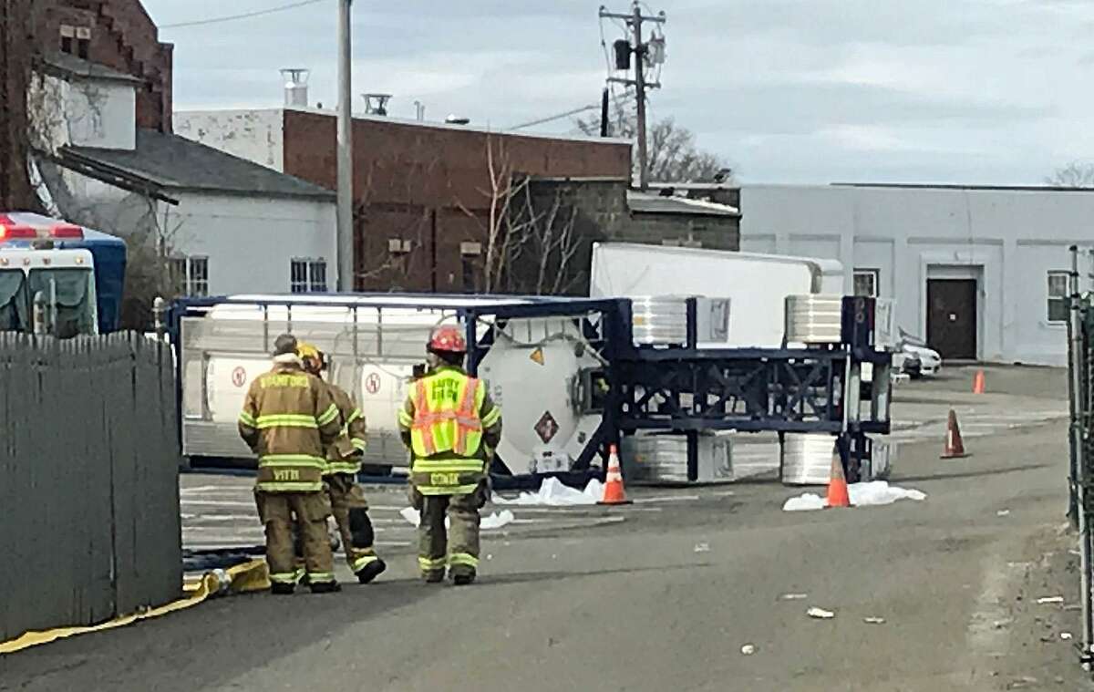An overturned truck near the corner of Selleck Street and Fairfield Avenue has roads closed and traffic at a standstill in Waterside on Monday, April 30, 2018. The truck turned over at about 8:30 a.m. Monday and police have closed Fairfield Avenue near Selleck and are routing traffic around the accident. Radio dispatches from firefighters in the area say the truck was carrying a flammable liquid, but it appears the truck is not leaking.