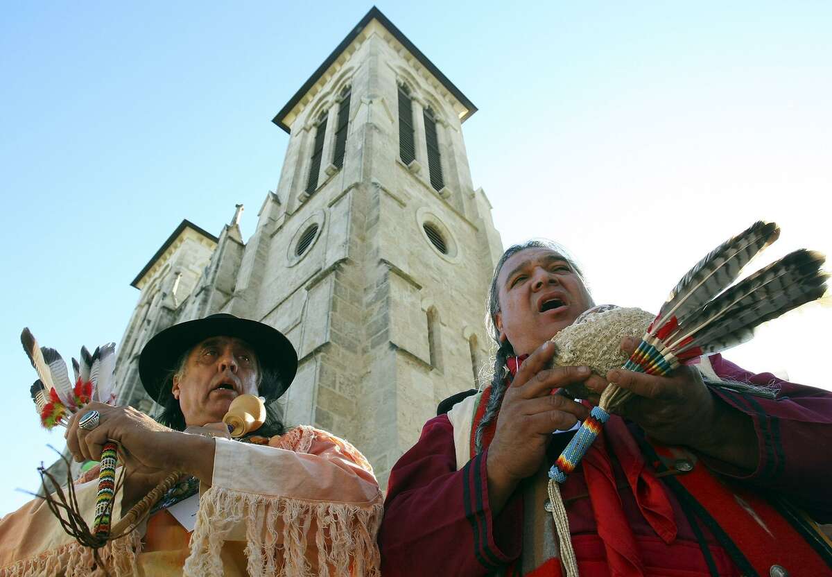 Ramon Vasquez Y Sanchez (left) and Isaac Alvarez Cardenas, members of the Tap Pilam Coahuiltecan Nation, take part in an indigenous blessing in 2008 in Main Plaza.  A bill that would recognize Tap Pilam Coahuiltecan Nation as a Native American Indian tribe passed unanimously in the Texas House last month.