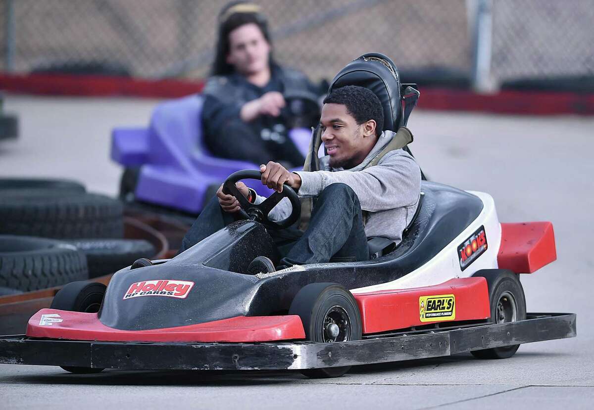New Haven resident Gerrod Tinsley, 24, beats his friend Ryan Lopez on a cart track Wednesday, April 18, 2018, during the only game in North Haven.  Partner Jack Bonfilio said. "We open 12-8 weather permitting and although it's not busy right now it will be full in a month."