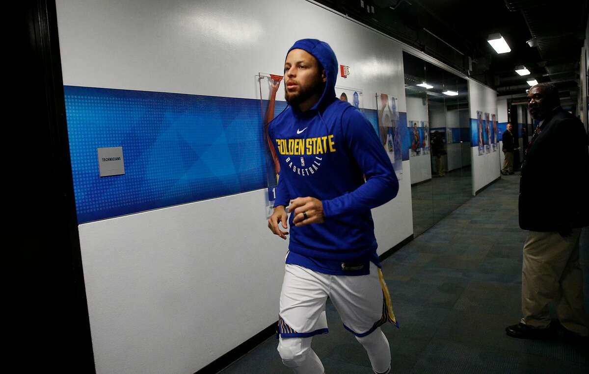 Warriors Stephen Curry, 30 from the locker room as the Golden State Warriors prepare to take on the New Orleans Pelicans in game one of the second round playoffs of the Western Conference finals at Oracle Arena in Oakland, Ca. on Sat. April 28, 2018.