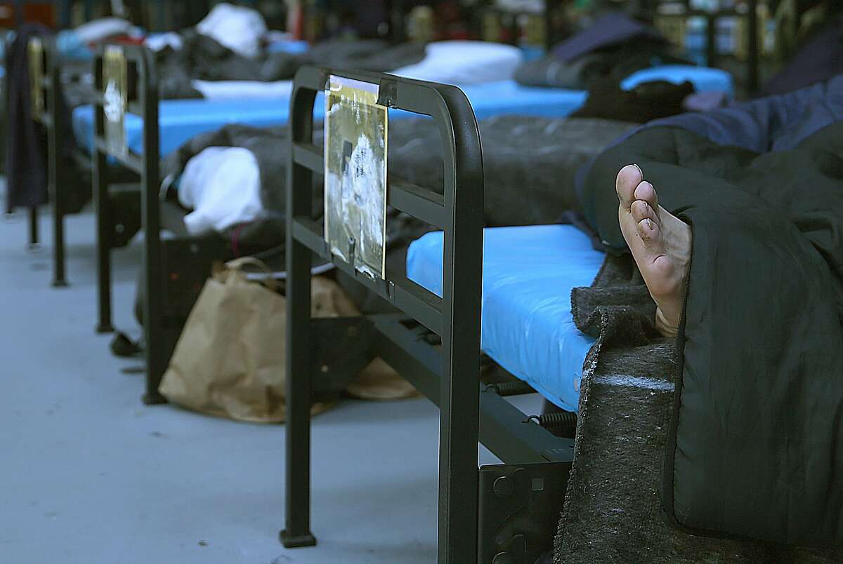 Men's bedding area at the latest Navigation Center, a one-stop comprehensive shelter aimed at quickly housing the homeless, on Monday, July 17, 2017 in San Francisco, Calif.