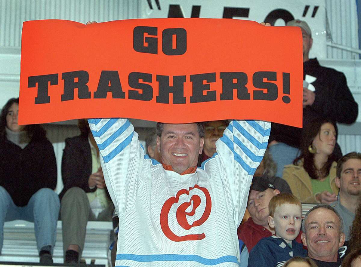 Nino Desposati of Danbury holds up a sign at the Trashers game Oct. 18, 2005