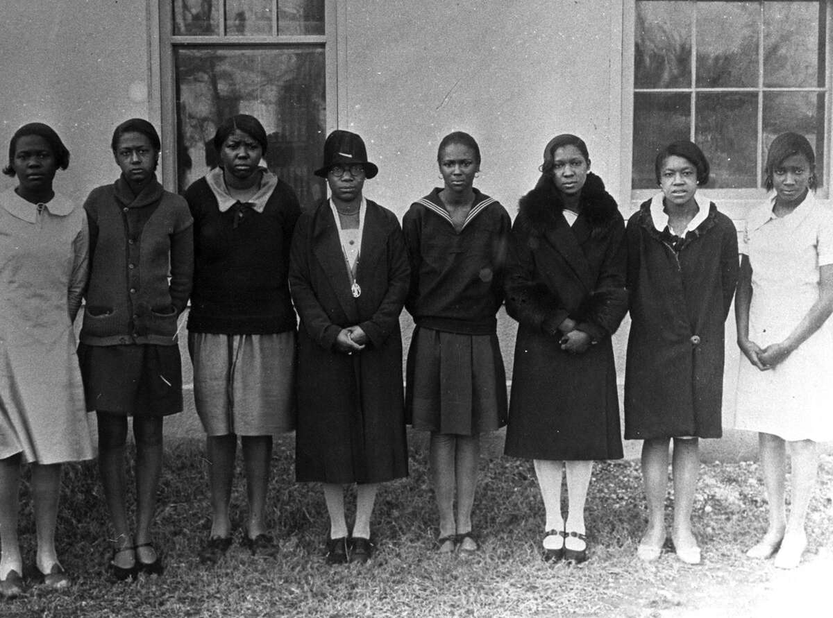 Artemisia Bowden, in hat, with a group of students at St. Philip's.