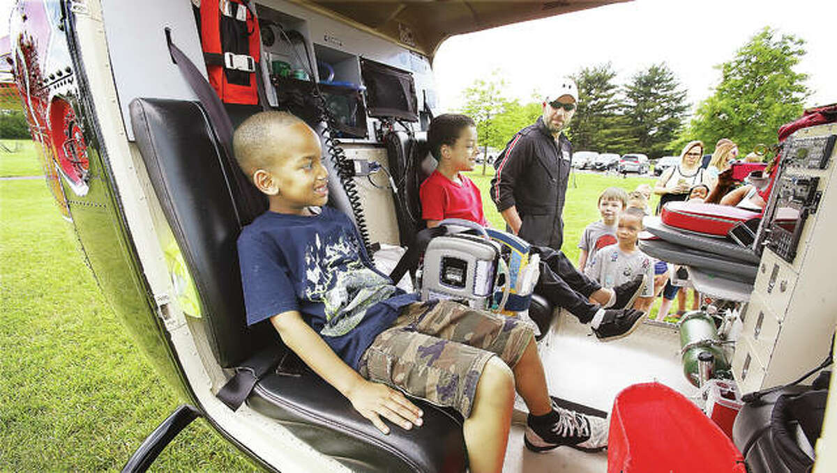 It wasn’t exactly a truck, but children seemed to have a blast climbing into the flight nurse seats of the Survival Flight helicopter ambulance, which was on display at last year’s Big Truck Day event in Godfrey’s Glazebrook Park. This year’s event will be Wednesday, May 9.