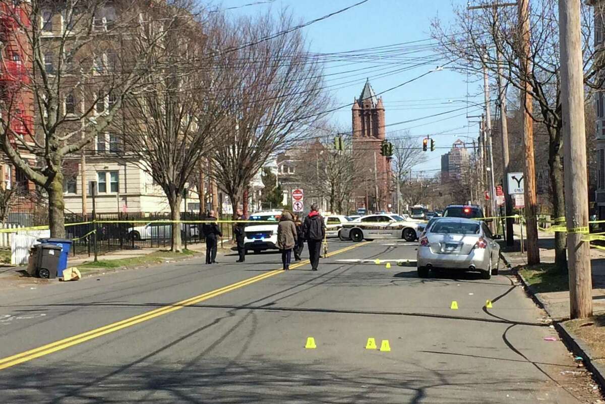 Police and emergency personnel responded to a fatal shooting on Chapel Street between Winthrop Avenue and Norton Street in New Haven April 11. The victim was identified as 35-year-old Eric Lewis.