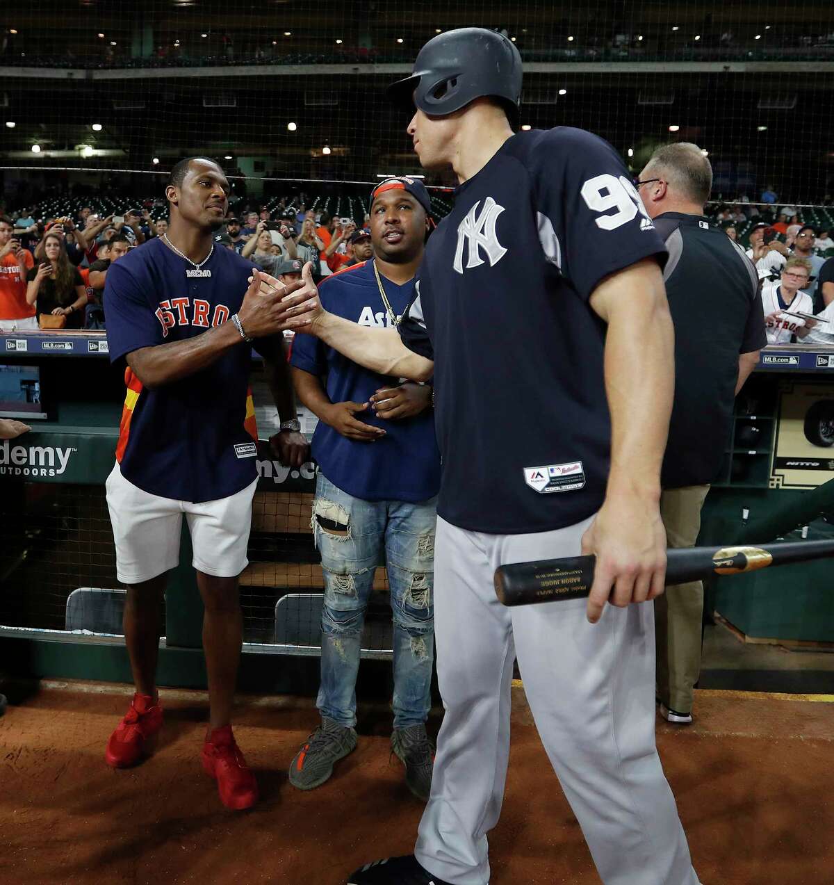 Houston Texans quarterback Deshaun Watson chats with New York Yankees Aaron Judge during batting practice before the start of an MLB game at Minute Maid Park, Tuesday, May 1, 2018, in Houston.