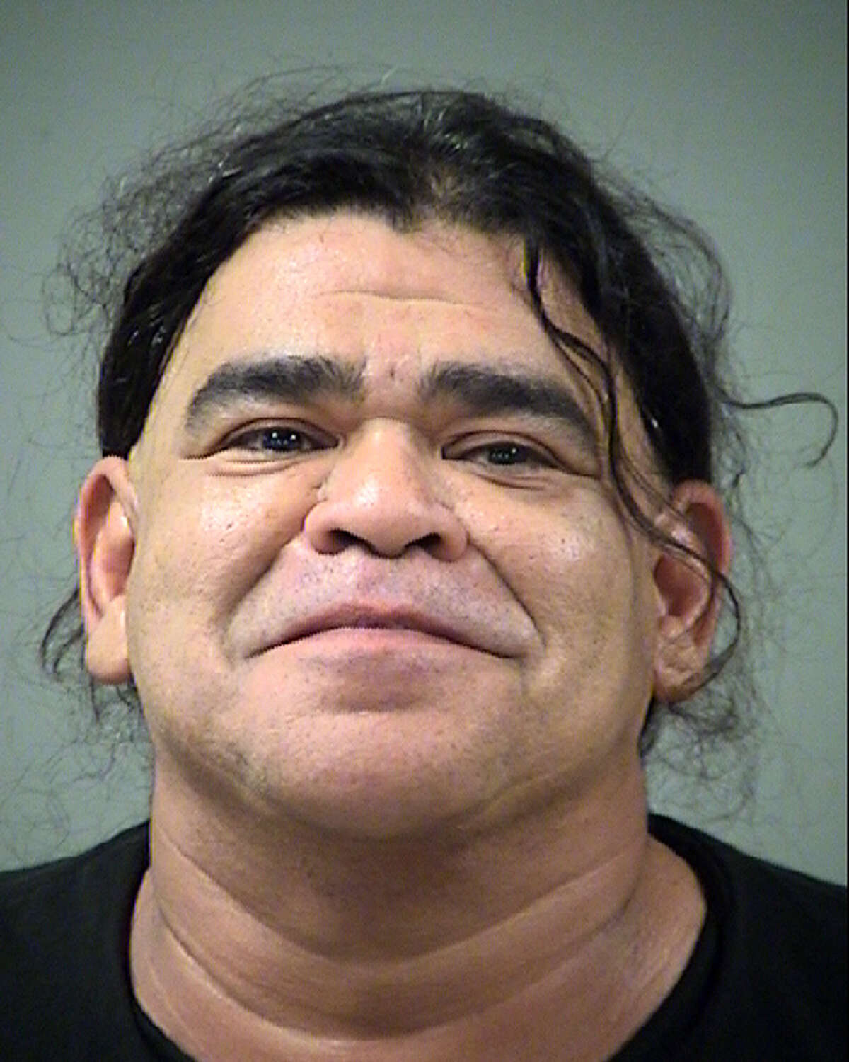 Manuel Romo, 49, charged with hindering apprehension, a third-degree felony,