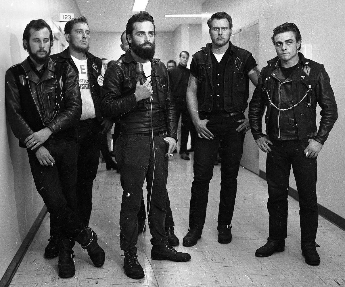 Hells Angels and other motorcycle club members participate in a debate at San Jose State with the Vietnam Day Committee including Allen Ginsberg. November 11, 1965