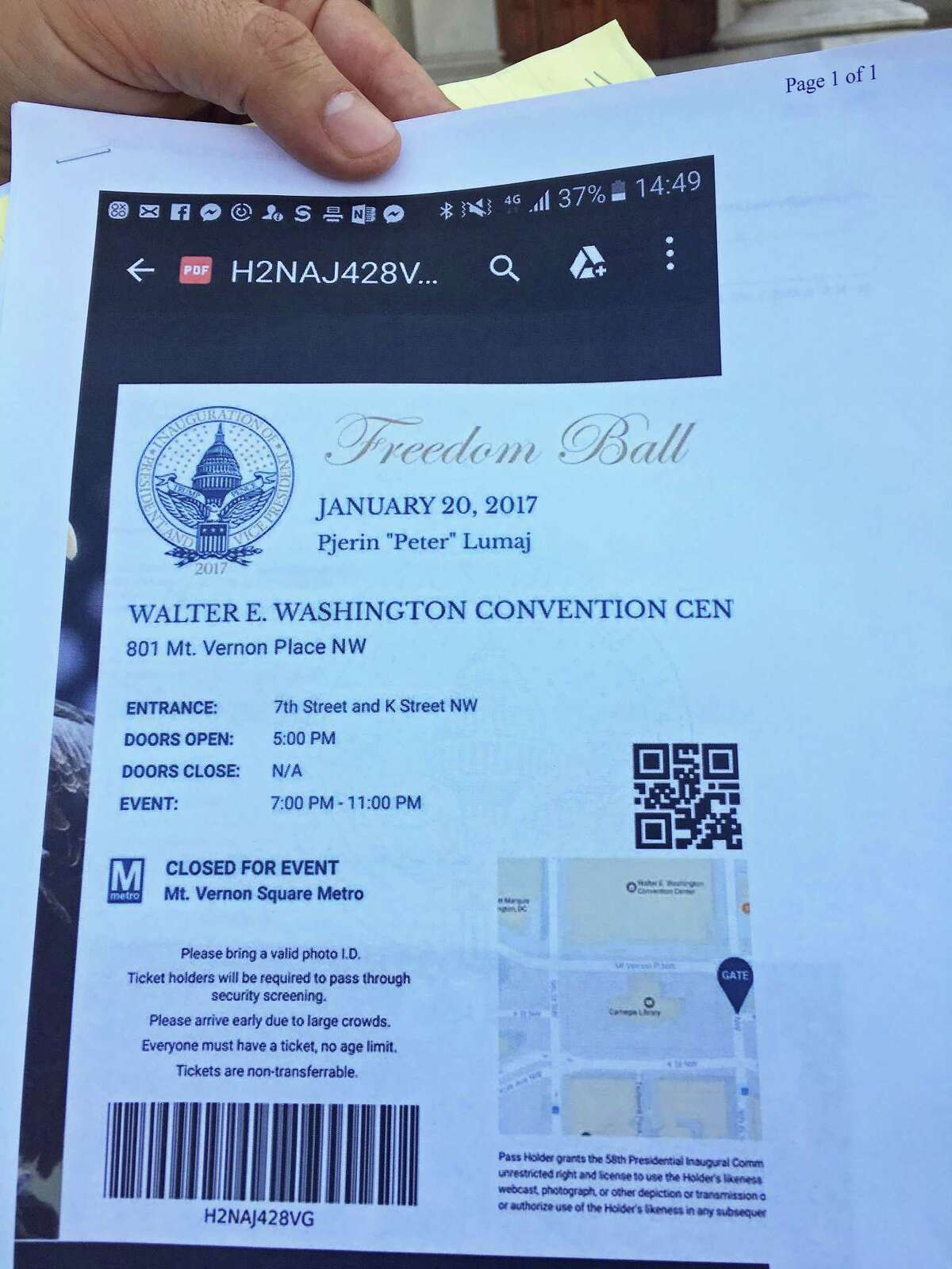 This is Republican gubernatorial candidate Peter Lumaj's ticket to the Freedom Ball, a public event held on the day of President Donald Trump's inauguration. Lumaj showed this ticket to reporters on Wednesday May 2, 2018, saying it was proof that he was "invited" to Trump's inauguration.
