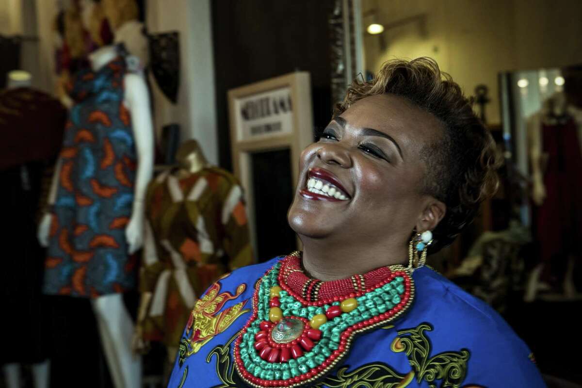 Jackie Adams, owner of Melodrama boutique, poses for a portrait in her store, with samples of African fashions displayed on mannequins on Tuesday, Feb. 20, 2018, in Houston. ( Brett Coomer / Houston Chronicle )