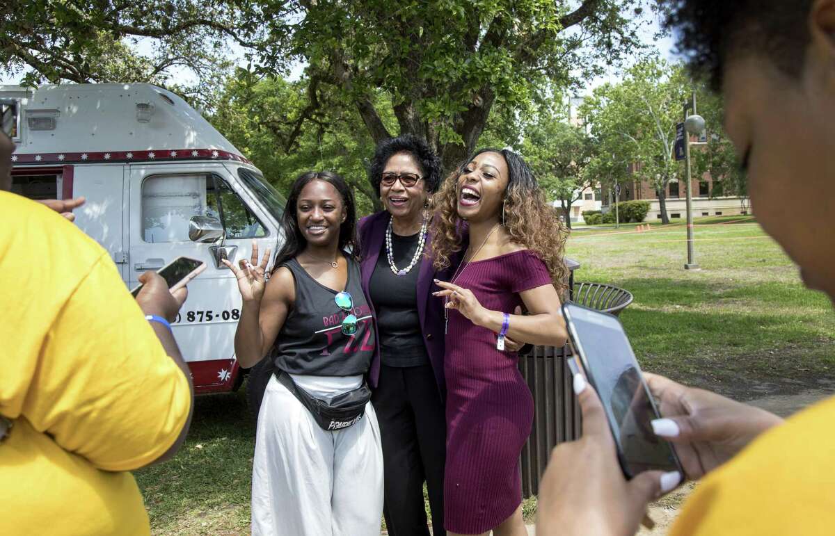 Ruth Simmons, center, president of Prairie View A&M University, poses with Phyllisa Reams, center-right, a fourth-generation Prairie View A&M University student studying biology and chemistry, and Jazmine Salsman, center-left, a junior from Houston studying business, during a campus festival at Prairie View A&M University, Thursday, April 12, 2018, in Prairie View. ( Jon Shapley / Houston Chronicle )