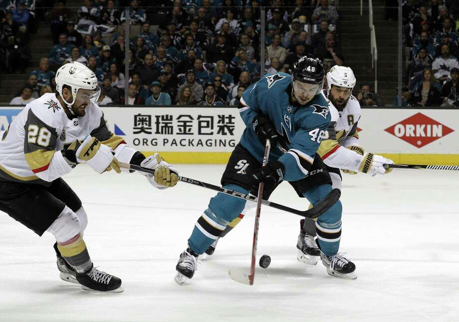 Tomas Hertl (48) tries to keep control of the puck in the first period as the San Jose Sharks play the Vegas Golden Knights in Game 4 of the second round of the NHL Western Conference playoffs at SAP Center in San Jose , Calif., on Wednesday, May 2, 2018. Photo: Carlos Avila Gonzalez / The Chronicle / Carlos Avila Gonzalez - San Francisco Chronicle