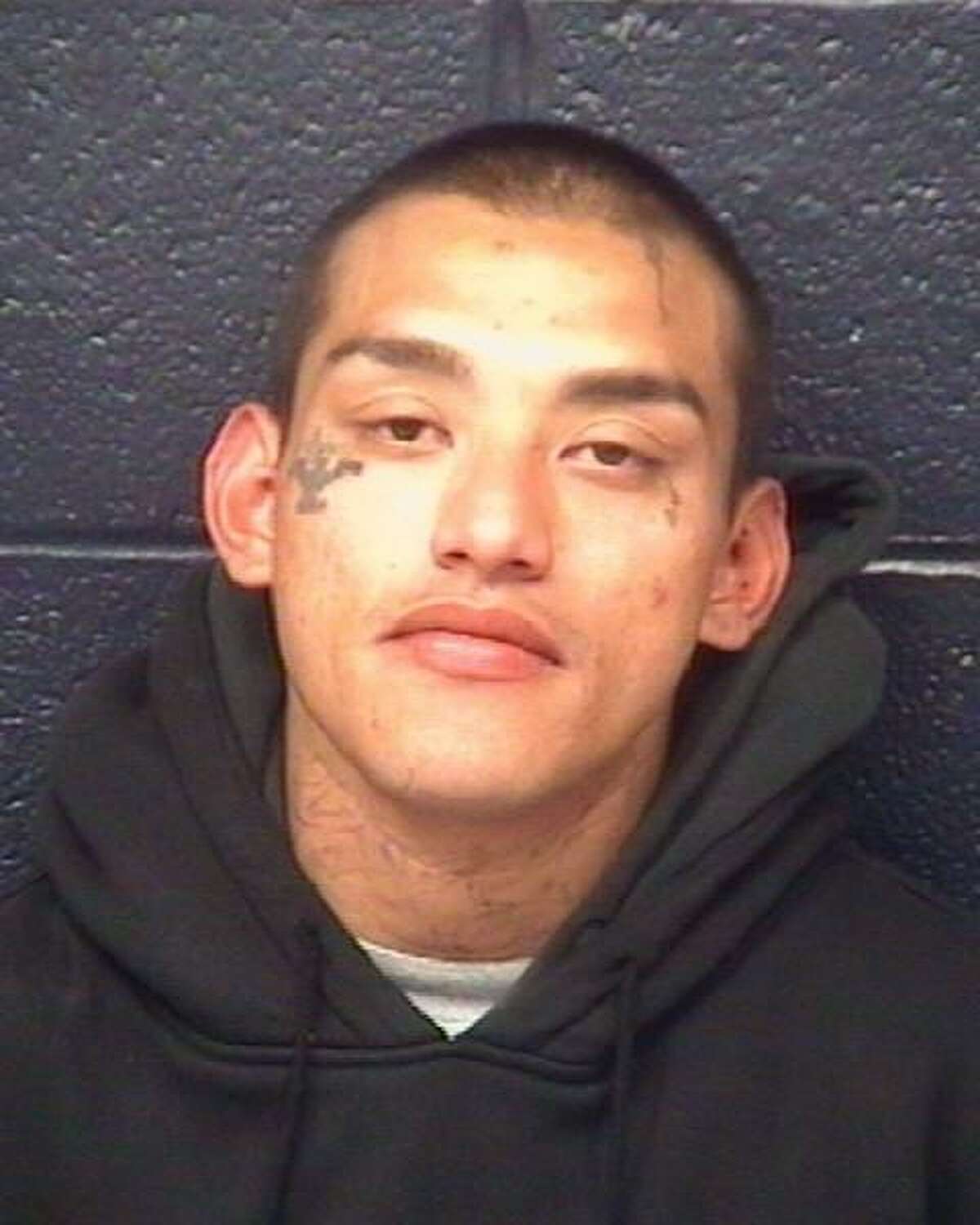 Julian Cruz, 29, is wanted on charges of burglary and theft.
