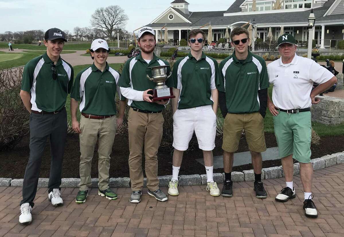 The Norwalk Bears won the 2018 Courville Cup with a 212-226 victory over Brien McMahon at the Shorehaven Country Club. Posing with the Cup are Norwalk players, from left, Connor Gilchrist, Sean Donnelly, Barry Belardinelli, Ryan Byrne, and John Hogan, along with head coach Ray Kodel. Donnelly, a freshman, won the John Connolly Trophy by firing a low match 46. Norwalk is now 2-7 while McMahon slipped to 0-6.