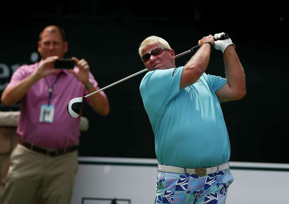John Daly tees off the 10th during the Woodforest National Bank Championship Pro-AM Thursday, May 3, 2018, in The Woodlands.