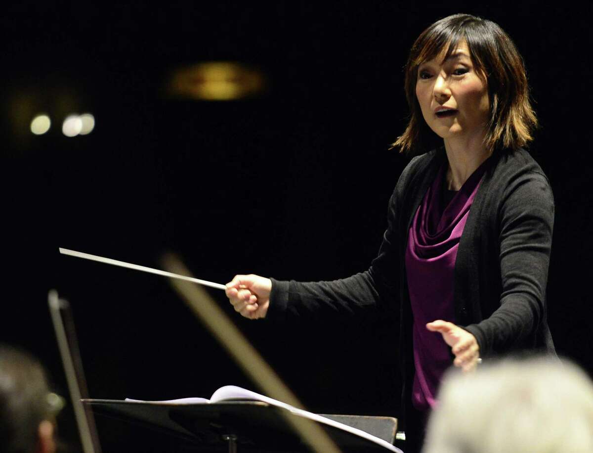 Rei Hotada, the final candidate for the Stamford Symphony's new conductor position, holds a sound check rehearsal for her upcoming performance Tchaikovsky & Saint-Saens at the Palace Theatre in Stamford, Conn. on April. 21, 2017.