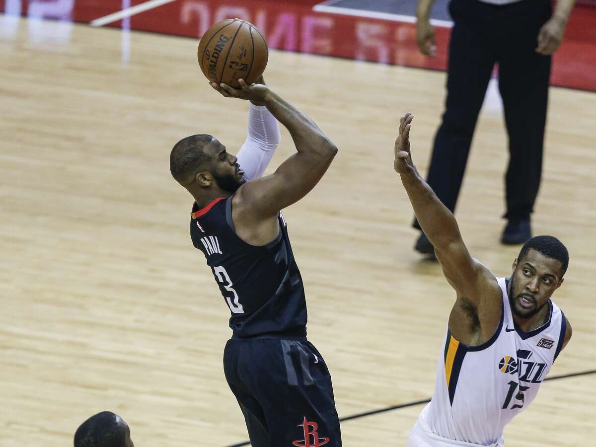 Houston Rockets guard Chris Paul (3) shoots over Utah Jazz guard Ricky Rubio (3) during the first half of Game 2 of the NBA second-round playoff series at the Toyota Center Wednesday, May 2, 2018 in Houston. (Michael Ciaglo / Houston Chronicle)