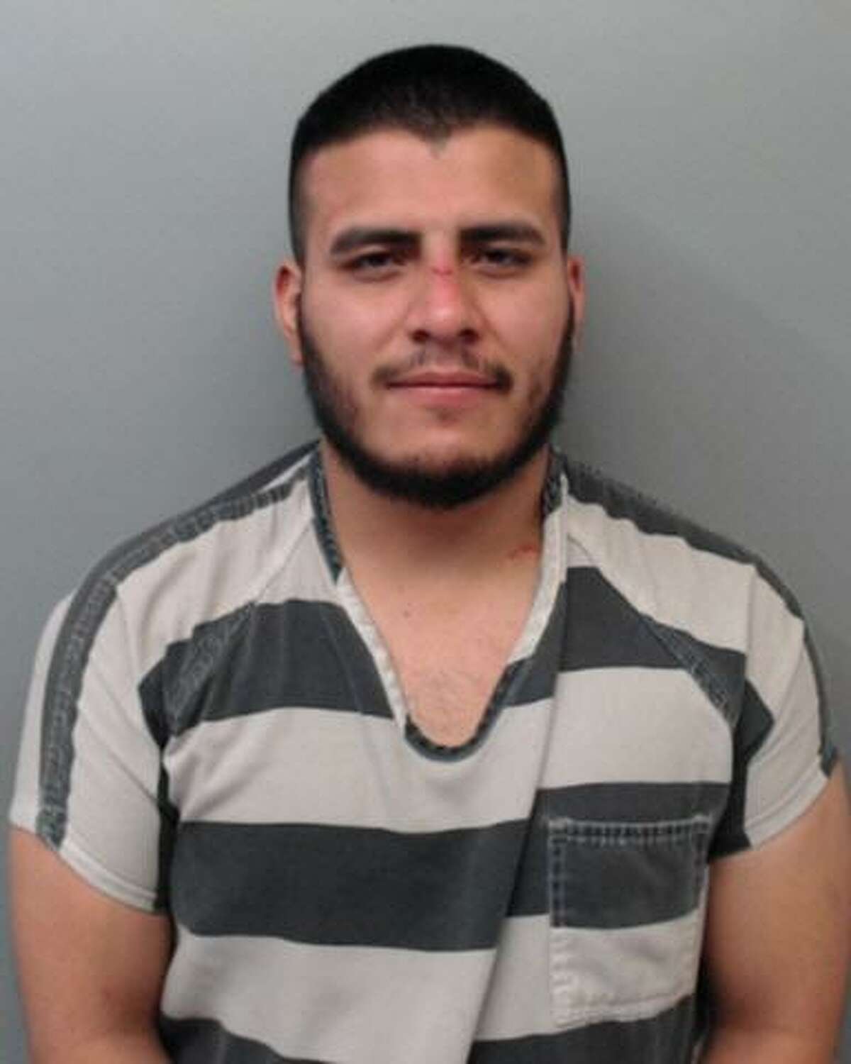 Adrian Fernando Flores, 22, was charged with assault on a public servant, evading arrest, resisting arrest and failing to give identification.