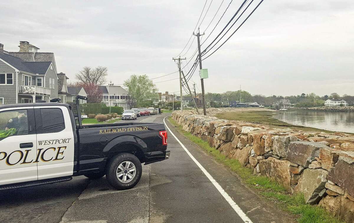 Harbor Road is closed in Westport after a man’s body was found on the waterline of the Saugatuck Shores beach area on Friday, May 4, 2018.