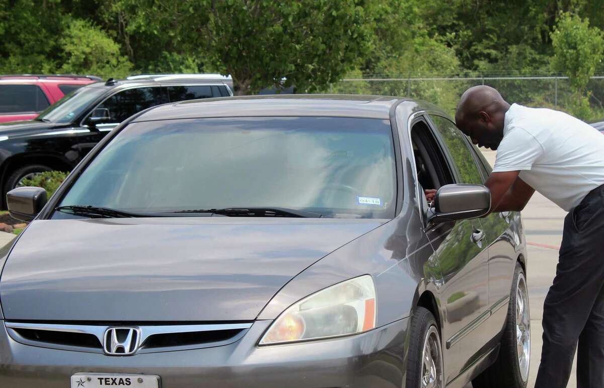 A drive-through prayer is offered at The Luke Church in Humble during the 2018 National Day of Prayer on May 3.