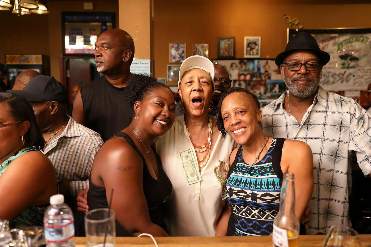 Cassie Nickelson (center), 80-year-old owner/chef of Scend's restaurant celebrating at her retirement party as seen in Emeryville, California on Saturday, July 22, 2017. On the left of Cassie is Nicole Scott, and the right of Cassie is Cassie's daughter, Debora Nickelson. Floyd Johnson (far right), Debora's brother-in-law.Marshawn Lynch of the Oakland Raiders is planning to take over the restaurant sometime in the next month.