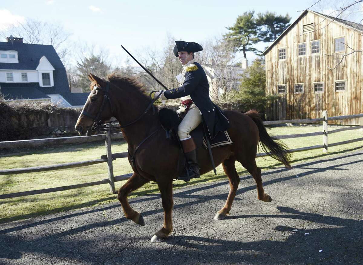 A photo from the annual reenactment of General Israel Putnam’s ride at Putnam Cottage in Greenwich on Feb. 26, 2017. A group of about 20 reenactors from Connecticut's Fifth Regiment portrayed the 1779 scene of General Putnam and his small group of Continental Army soldiers staving off an attack by the British at Putnam Cottage.