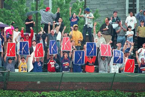 Fans in Chicago's Wrigley Field bleachers flash 'K' signs during the performance by Cubs rookie pitcher Kerry Wood against the Houston Astros on Wednesday, May 6, 1998. Wood tied the major league record with 20 strikeouts in a nine-inning game, pitching a one-hitter Wednesday to lead the Cubs to a 2-0 win over the Astros. ( AP Photo/Chicago Sun-Times, Richard A. Chapman)  HOUCHRON CAPTION (05/07/1998):  The fans at  Wrigley Field were going k-k-k-k-k-k-k-k-k-k-k-k-k-k-k-k-k-k-k-k-krazy over rookie Kerry Wood.