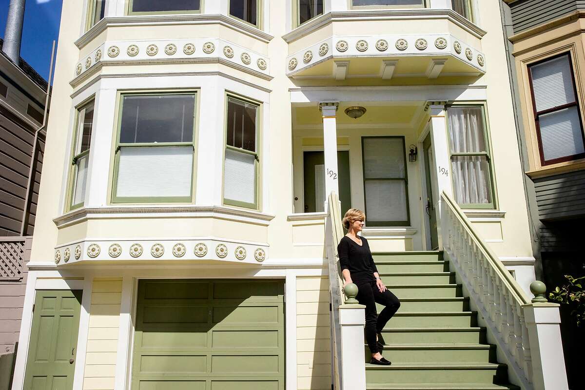 Linda Crowe stands for a portrait outside her new home, Thursday, May 3, 2018, in San Francisco, Calif.