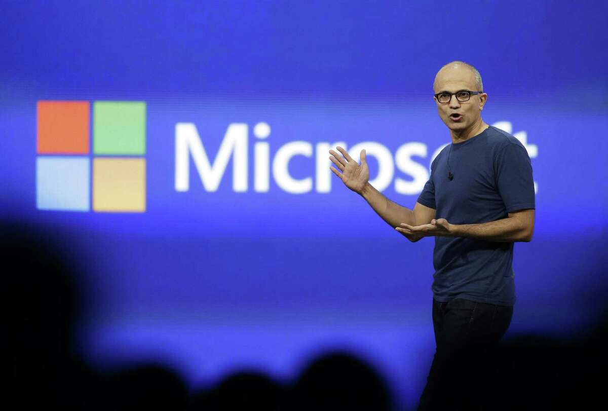 FILE - In this April 2, 2014 file photo, Microsoft CEO Satya Nadella gestures during the keynote address of the Build Conference in San Francisco. Microsoft on Thursday, July 17, 2014 announced it will lay off 18,000 workers over the next year. (AP Photo/Eric Risberg, File)