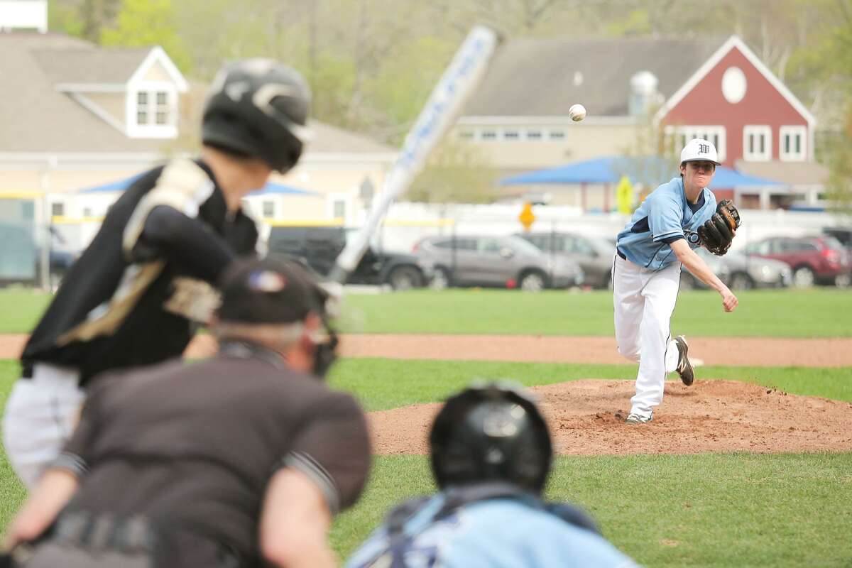 Lucas Uriarte throws a pitch during Wilton's 3-0 loss to Trumbull in Wilton, Conn. on Friday, May 4, 2018.