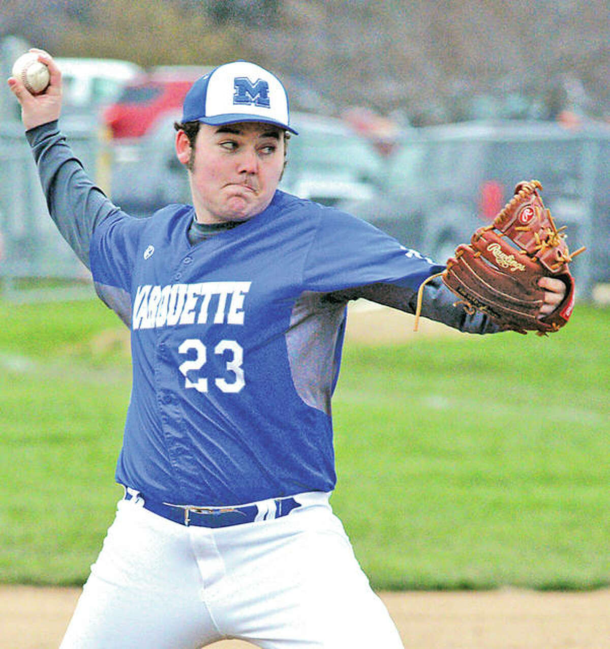 Marquette’s Luke Simmons scattered seven hits, walked five and struck out nine in his team’s 8-3 victory over East Alton-Wood River Friday.