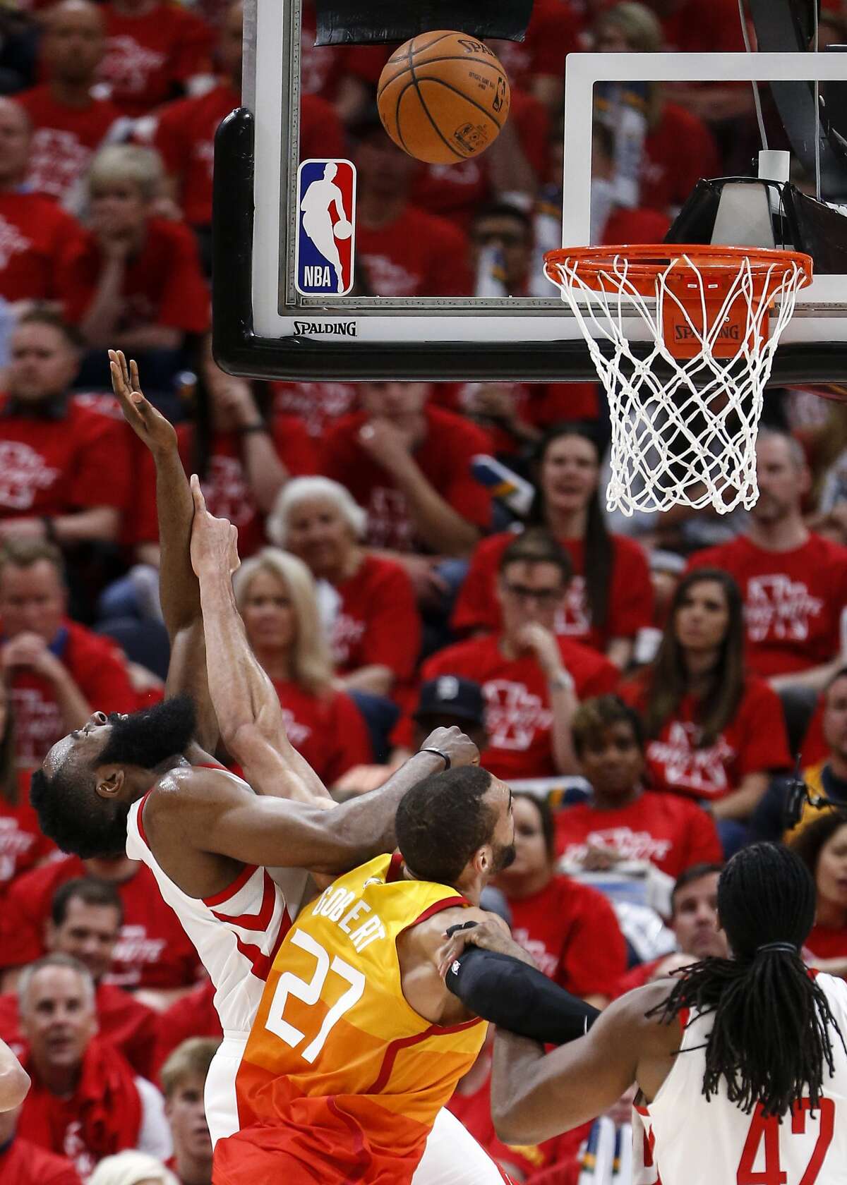 Houston Rockets guard James Harden (13) is fouled by Utah Jazz center Rudy Gobert (27) as he takes a shot during the second half of Game 3 of the NBA second-round playoff series at Vivint Smart Home Arena Friday, May 4, 2018 in Salt Lake City. (Michael Ciaglo / Houston Chronicle)