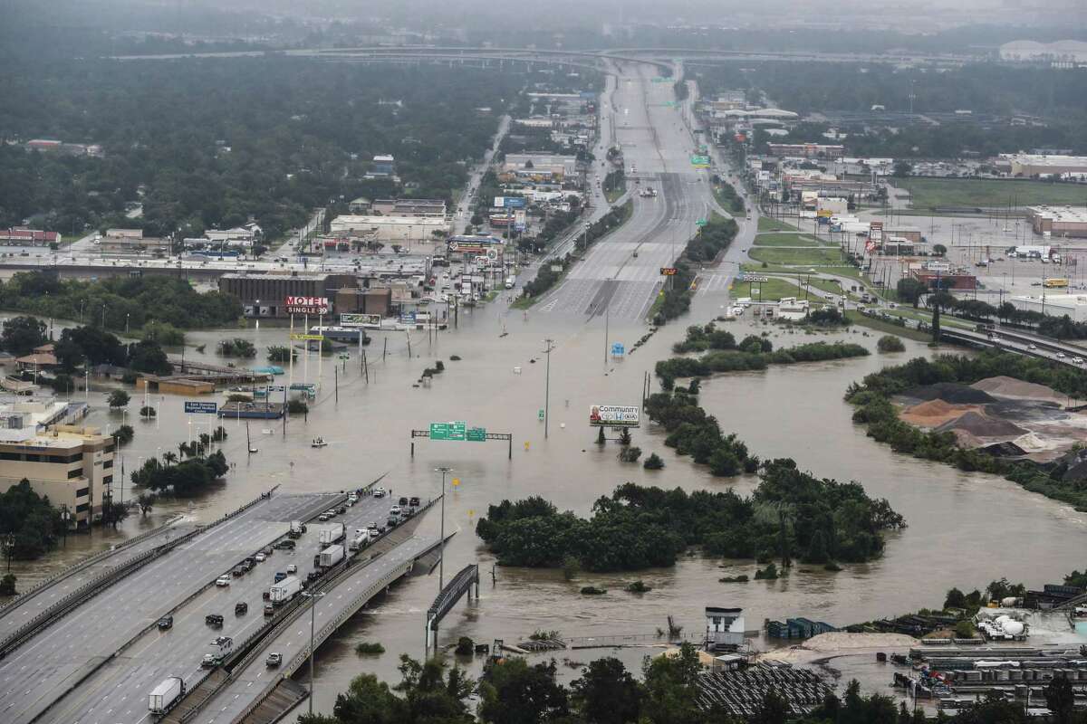 Interstate 10 at Market is shown blocked by floodwaters from Tropical Storm Harvey on Tuesday, Aug. 29, 2017, in Houston. ( Brett Coomer / Houston Chronicle )