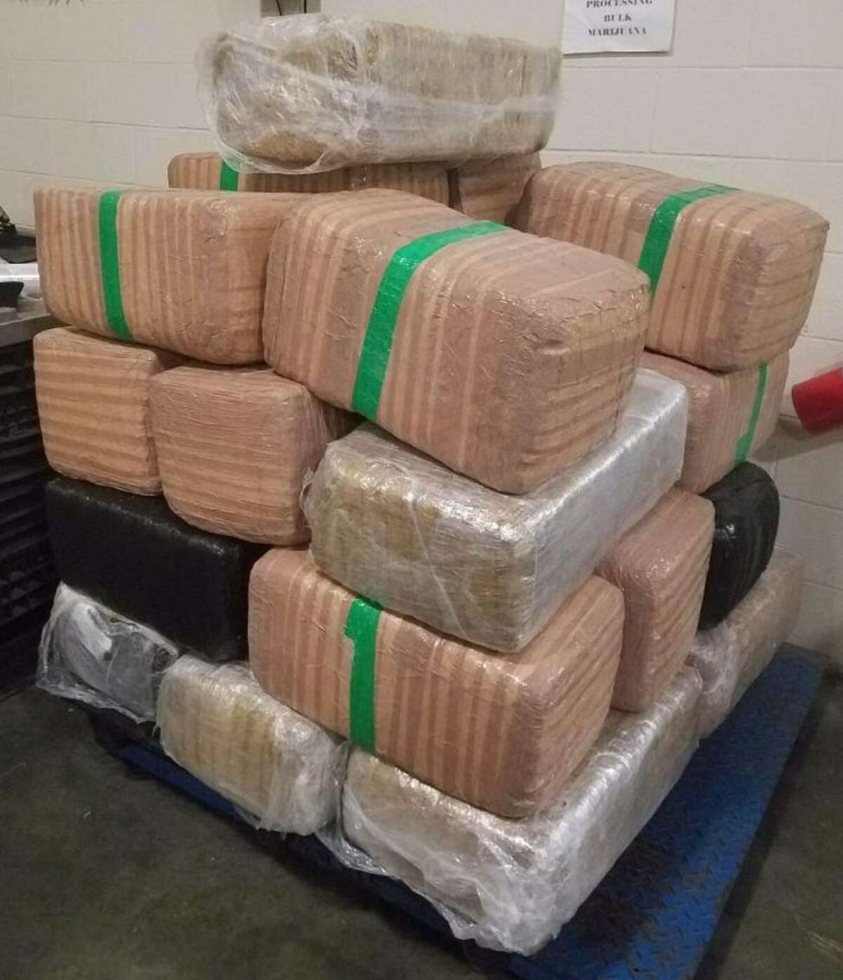 Laredo police seized about 1,100 pounds of marijuana late Wednesday following a brief vehicle pursuit.