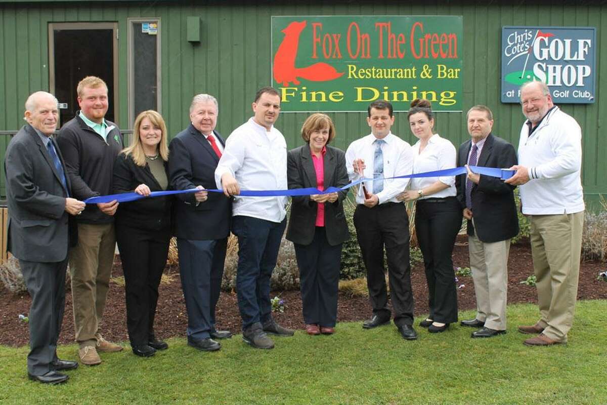 Fox on the Green Restaurant & Bar held a grand opening April 19 at Portland Golf Course. From left are Middlesex County Chamber of Commerce President Larry McHugh, golf course manager Jack Kelly, Laurie Kelly, Chamber Vice Chairman Jay Polke, Fox on the Green’s Fico Cecunjanin, First Selectwoman Susan Bransfield, Fox on the Greens Alex Cecunjanin, Anela Cecunjanin, Chamber Chairman Rick Morin and golf course owner John Kelly.