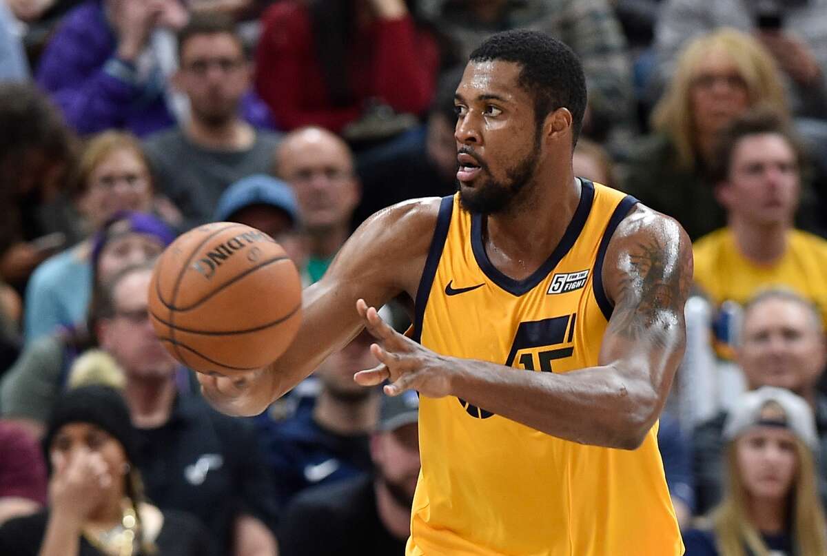 SALT LAKE CITY, UT - JANUARY 15: Derrick Favors #15 of the Utah Jazz passes the ball during a game against the Indiana Pacers at Vivint Smart Home Arena on January 15, 2018 in Salt Lake City, Utah. The Indiana Pacers won 109-94. NOTE TO USER: User expressly acknowledges and agrees that, by downloading and or using this photograph, User is consenting to the terms and conditions of the Getty Images License Agreement. (Photo by Gene Sweeney Jr./Getty Images)