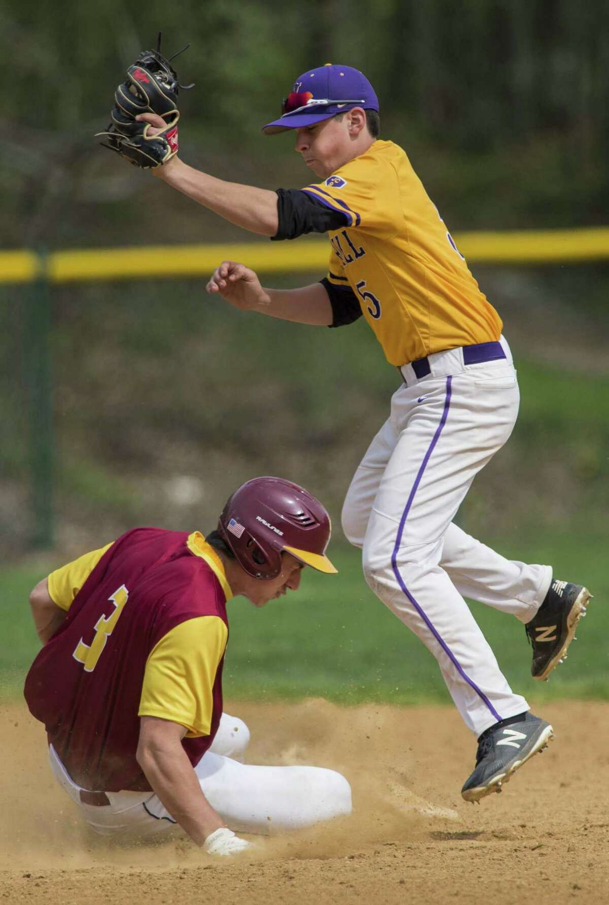 St. Joseph High School?’s Stephen Paolini slides safely into second as Westhill High School?’s Timothy Wainwright can?’t get the tag down in time during a baseball game played at St. Joseph High School, Trumbull, CT. Saturday, May 5, 2018.