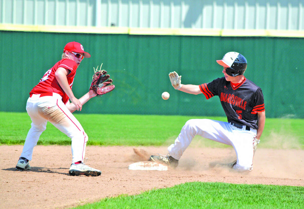 Edwardsville junior Blake Burris, right, steals second base during the fourth inning of Saturday’s game against Chatham Glenwood in the 12th annual Tiger Classic at Tom Pile Field.