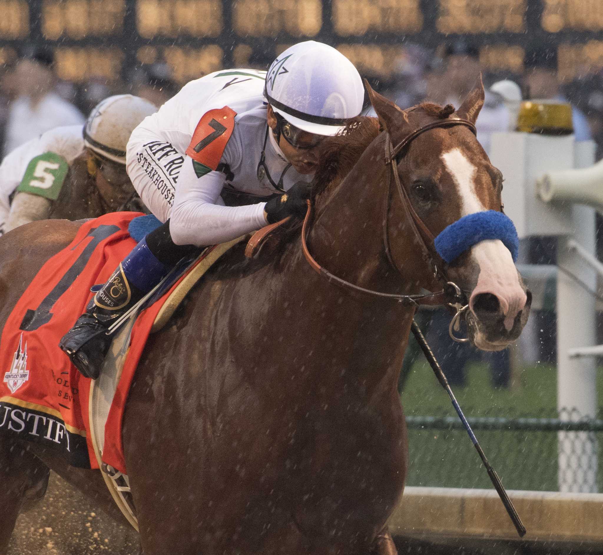 Lucarelli celebrates Justify's victory