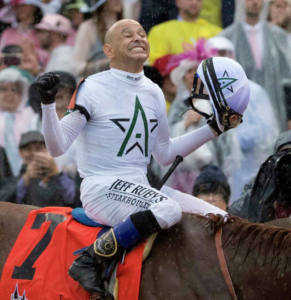 Justify with jockey Mike Smith is all smiles as he heads to the winner's circle after winning the 144th running of the Kentucky Derby at Churchill Downs Saturday May 5, 2018 in Louisville, Kentucky (Skip Dickstein/Times Union)