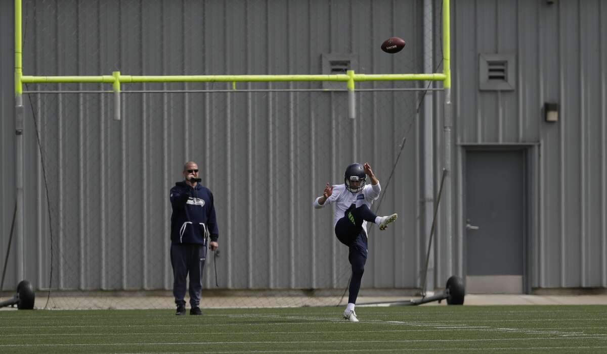 Oh, so that's why Seattle traded up for a punter  Pete Carroll was excited to land Michael Dickson in the fifth round of the draft, and after three days of minicamp, it's easy to see why. Dickson's leg strength and ability to locate his punts is more than impressive. Also, he can drop-kick the ball halfway down the field. On Sunday, a handful of media members spent about 10-15 minutes watching Dickson try and angle punts into a trash can from about 40-50 yards out -- which he eventually did. Dickson was brought in to compete with Jon Ryan and after a few days I can say the following sentence genuinely: That will be a fun battle to watch. "He does have an array of things he can do with the ball," Carroll said of Dickson.  