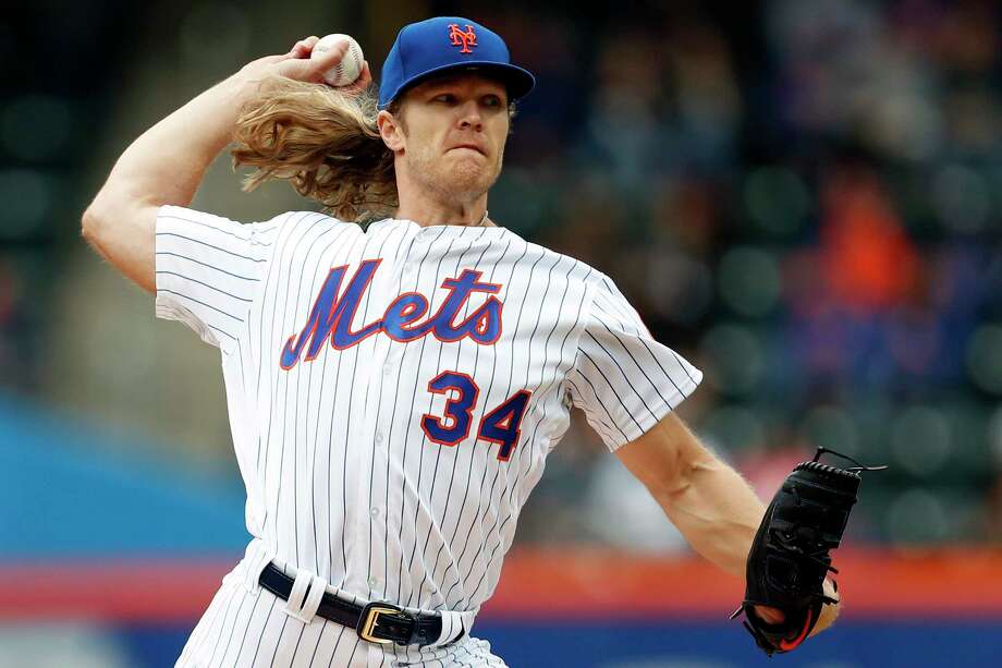 New York Mets starting pitcher Noah Syndergaard delivers during the first inning of a baseball game against the Colorado Rockies on Sunday, May 6, 2018, in New York. (AP Photo/Adam Hunger) Photo: Adam Hunger / FR110666 AP