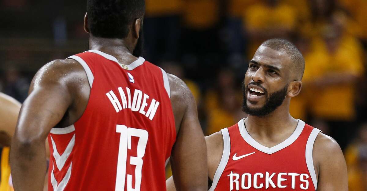 Houston Rockets guard James Harden (13) and Houston Rockets guard Chris Paul (3) embrace during the second half of Game 4 of the NBA second-round playoff series against the Utah Jazz at Vivint Smart Home Arena Sunday, May 6, 2018 in Salt Lake City. (Michael Ciaglo / Houston Chronicle)