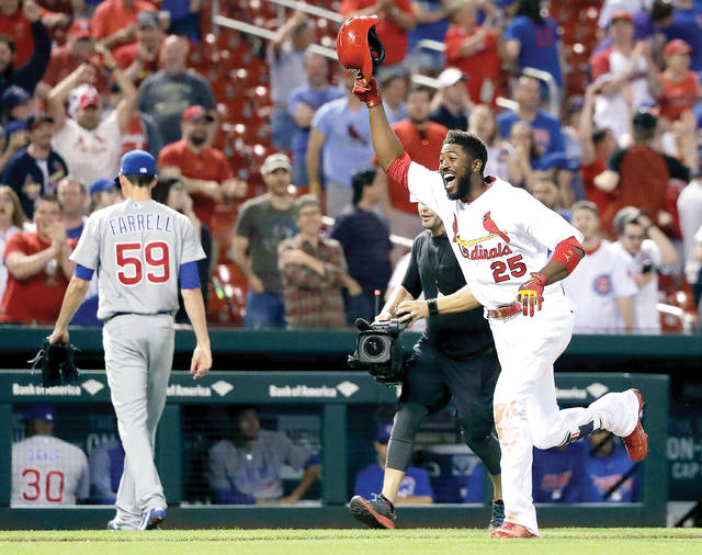 Molina lifts Cards to 3-2 win over Cubs in 10 innings