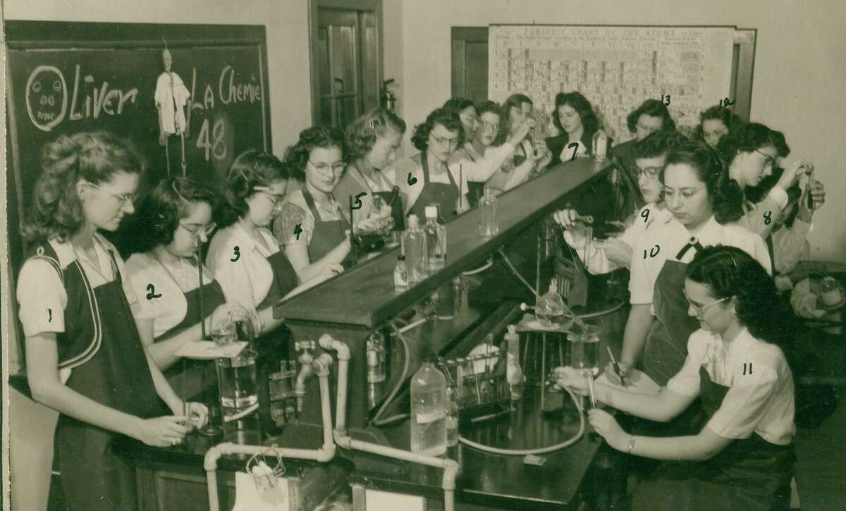 This undated photo shows a group of students in a chemistry class at the former Ursuline Academy.