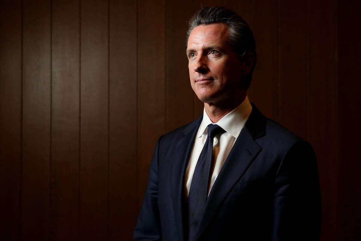 California Lt. Gov. Gavin Newsom stands for a portrait before an interview with the San Francisco Chronicle editorial board, Wednesday, April 18, 2018, in San Francisco, Calif.