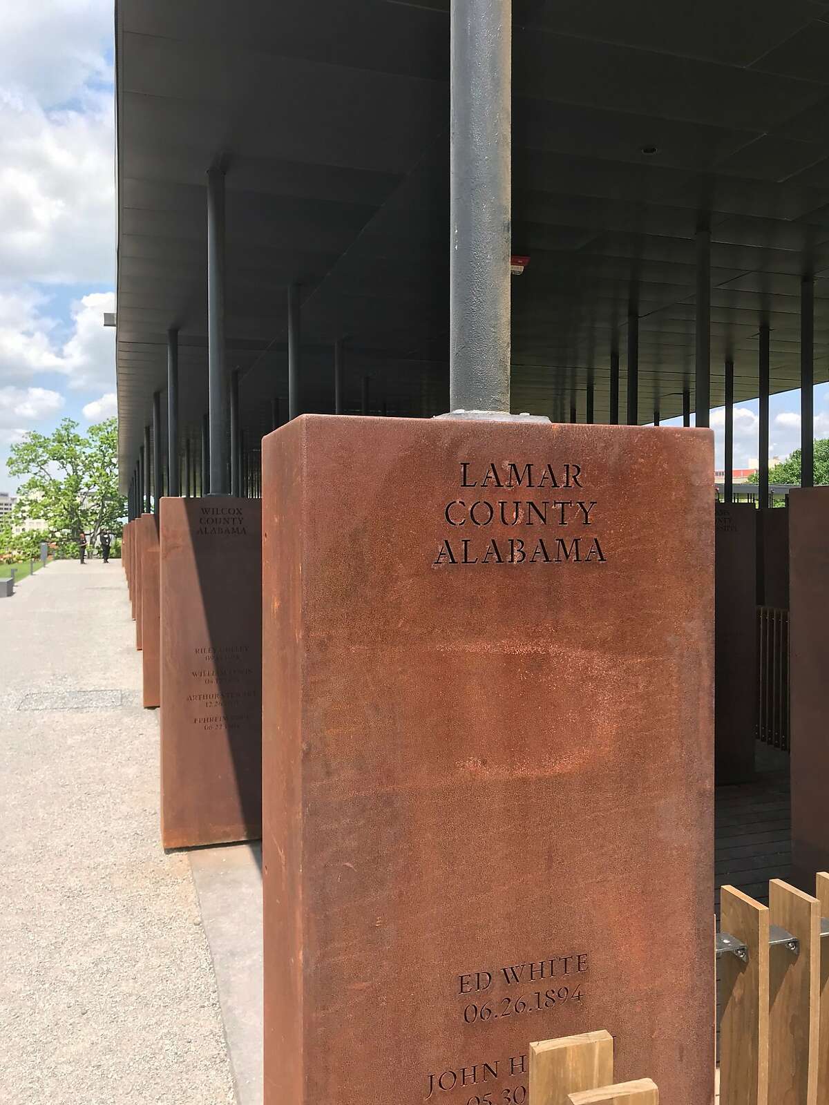 Photographer: Ian MagruderDate: April 27, 2018Place: National Memorial for Peace and Justice, the nation�s first memorial dedicated to the legacy of enslaved black peopleMontgomery, AlabamaThe memorial structure on the center of the site is constructed of over 800 corten steel monuments, one for each county in the United States where a racial terror lynching took place. The names of the lynching victims are engraved in the columns, along with the date of the lynching.