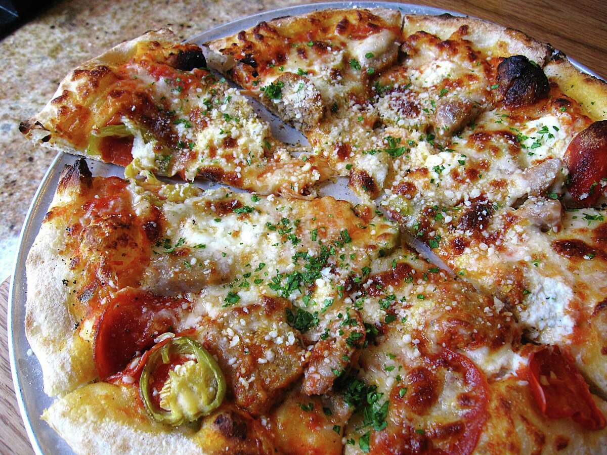 Buddy's Favorite pizza with Italian sausage, meatballs, pepperoni, cherry peppers, ricotta, mozzarella and provolone from Buddy V's Ristorante.