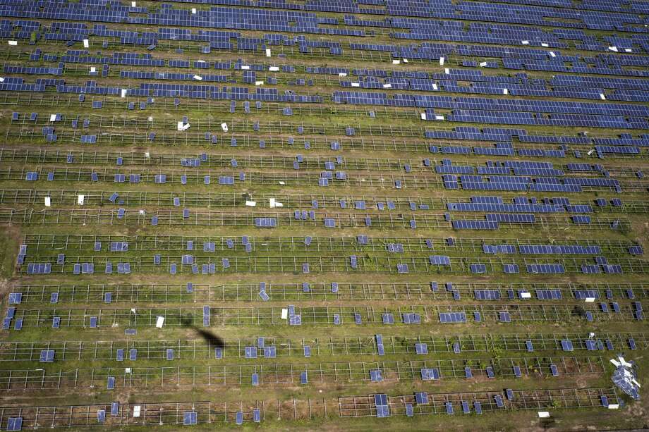 Solar panels damaged during Hurricane Maria on the eastern edge of Puerto Rico on Feb. 4, 2018. It took months to restore electricity in Puerto Rico after hurricanes dealt a one-two punch, and the systemâs future is far from certain. (Todd Heisler/The New York Times) Photo: TODD HEISLER/NYT